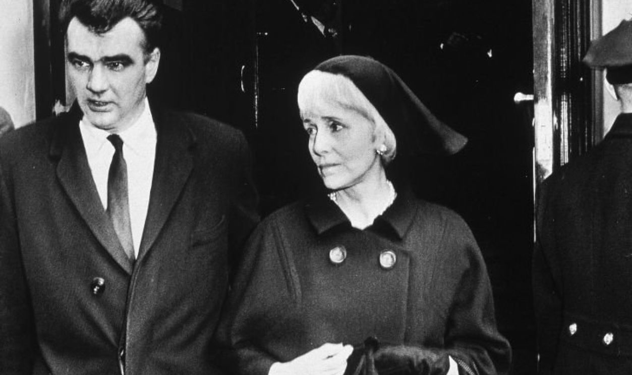 American playwright and diplomat Clare Boothe Luce (1903 - 1987) leaves the Madison Avenue Presbyterian Church after the funeral of her husband Henry Luce, New York City, 3rd March 1967. She is escorted by Henry Luce III, Mr Luce's son by his first marriage.