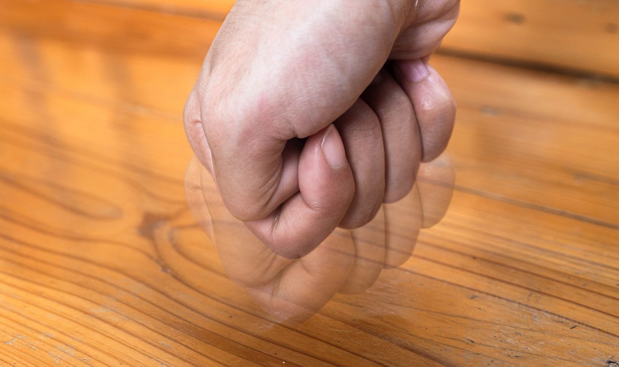 Shutterstock - 2178027769 - Knock on wood, culture, ward off bad luck.