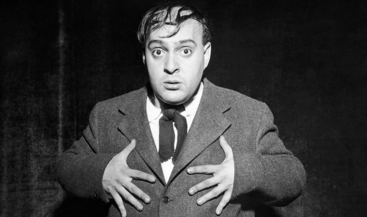 circa 1955: American comedian and actor Zero Mostel (1915 - 1977) performs his stand-up routine as the Southern poll-tax Senator.