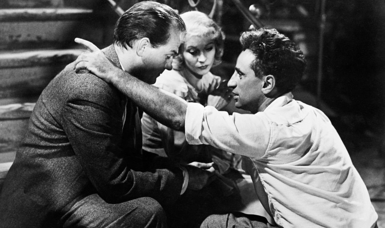 Director Elia Kazan (right) gives instructions to actors Karl Malden and Vivien Leigh before shooting a scene from the movie A Streetcar Named Desire.