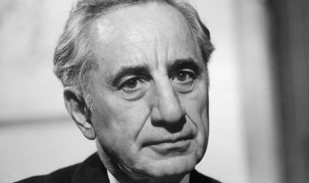 STOCKHOLM, SWEDEN: Elia Kazan (1909- ), stage and film director, born in Istanbul, poses for photographer during a visit to Stockholm 28 November 1969. Kazan acted in minor roles before becoming a theatre director, particularly known for his productions of plays by Arthur Miller and Tennessee Williams, and as a co-founder of the Actors' Studio (1947). In 1944 Kazan began as a film director and won Oscars for "Gentleman's Agreement (1948) and "On the Waterfront" (1954).