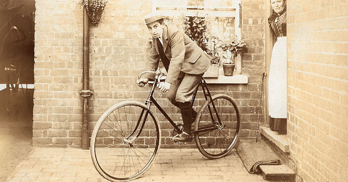 Early 1900s bicycle and its proud owner