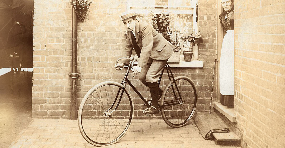 Early 1900s bicycle and its proud owner