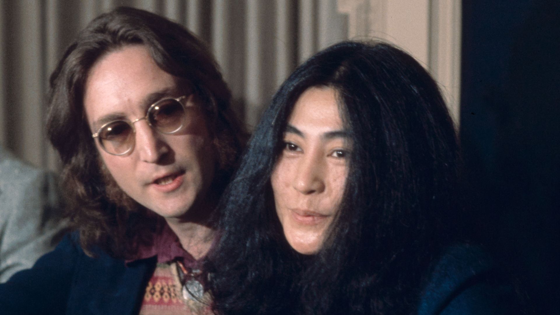 John Lennon and Yoko Ono at a New York press conference on April 2nd, 1973 where they would announce the conceptual country of Nutopia.