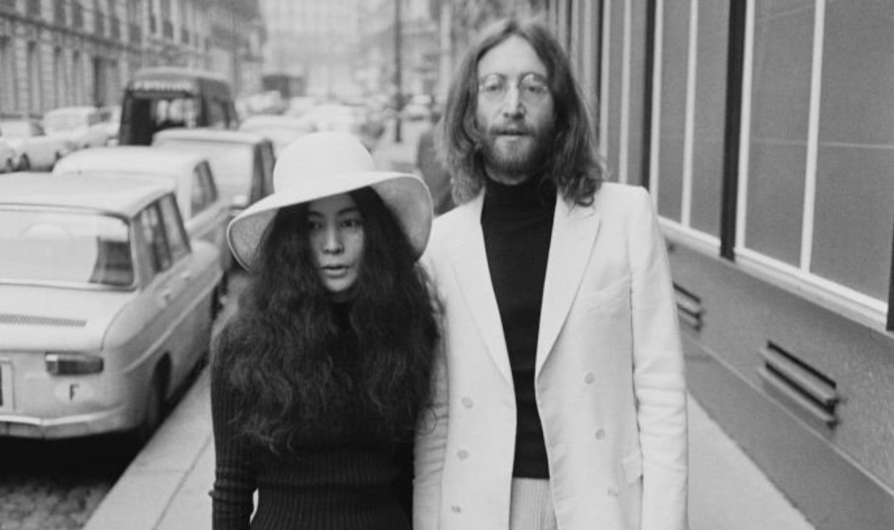 Married couple, Japanese multimedia artist, singer, songwriter, and peace activist Yoko Ono and English singer, songwriter, and peace activist John Lennon (1940 - 1980) in Paris for their honeymoon, France, 23rd March 1969.