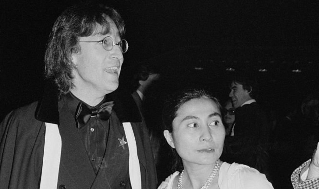 Yoko Ono with John Lennon in formal dress; circa 1960; New York.