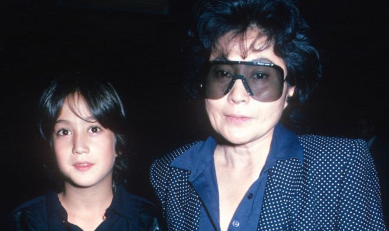 View of (future musician) Sean Lennon and his mother, Japanese artist, musician, & activist Yoko Ono, as they attend a premiere of 'Mishima' at the Japan Society, New York, New York, September 17, 1985. 
