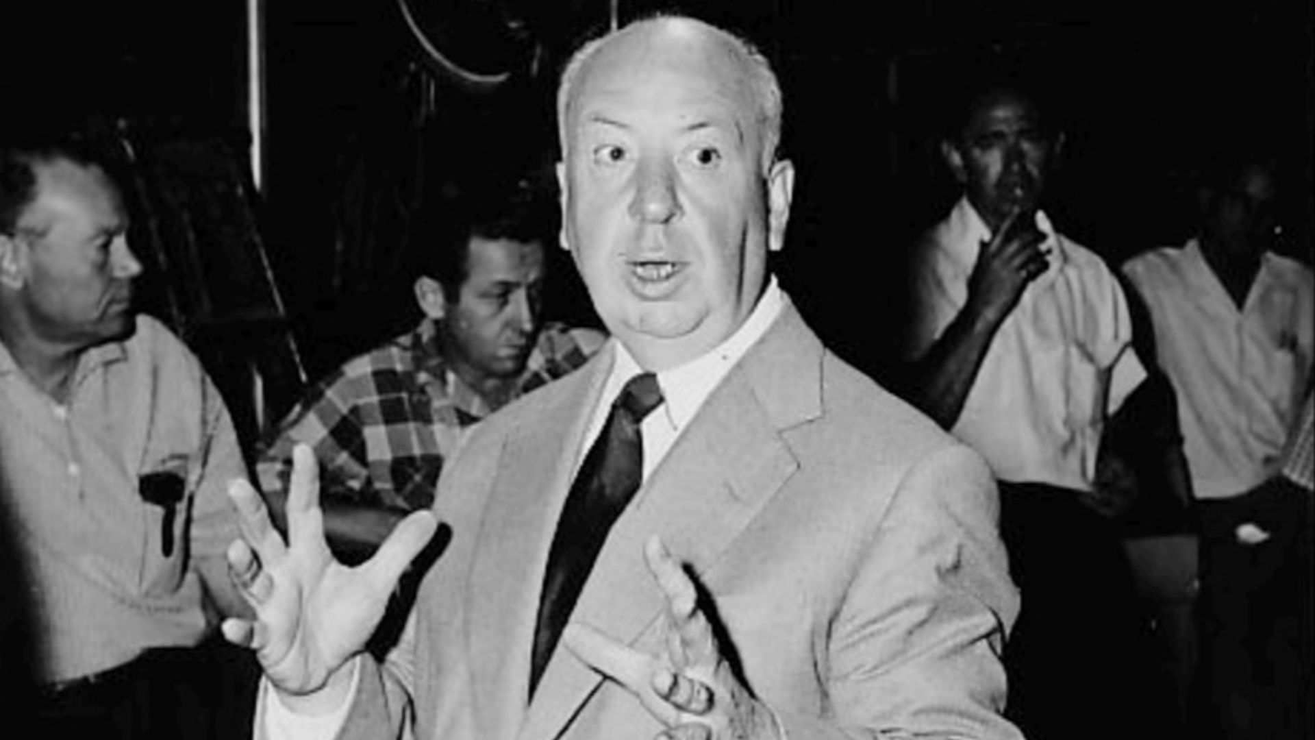 Photo of Alfred Hitchcock on the set of his new television program, Alfred Hitchcock Presents.
