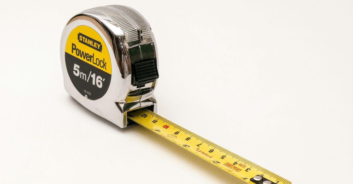 a close up of a tape measure on a white background