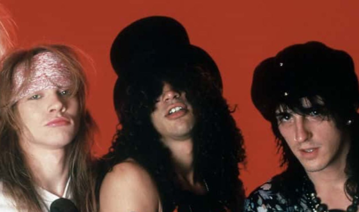 DETROIT, MI - MAY 7: (L-R) Drummer Steven Adler, Duff McKagan, vocals Axl Rose, guitarist Slash and guitarist Izzy Stradlin of the music group Guns N' Roses pose for a portrait on May 7, 1988, at the Detroit State Theater in Detroit, Michigan.