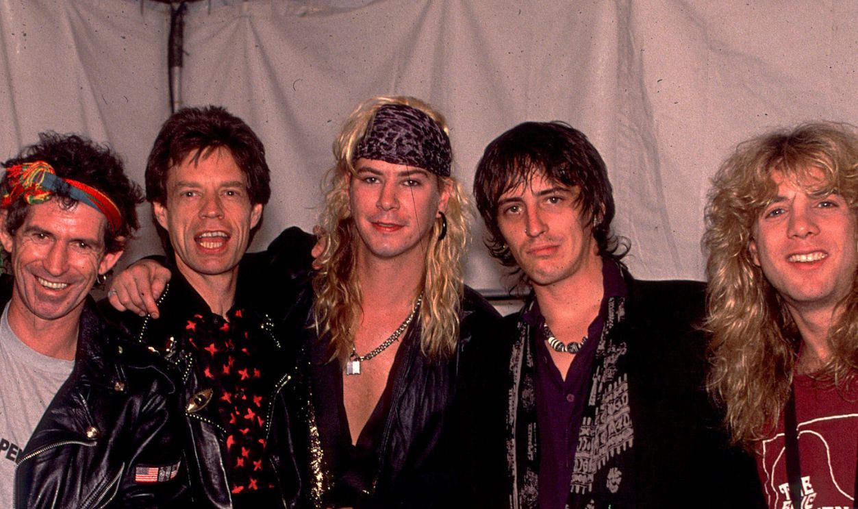 Axl Rose, Charlie Watts, Keith Richards, Mick Jagger, Duff McKagan, Izzy Stradlin and Steven Adler on the Rolling Stones' Steel Wheels Tour in 1989, Los Angeles, CA.