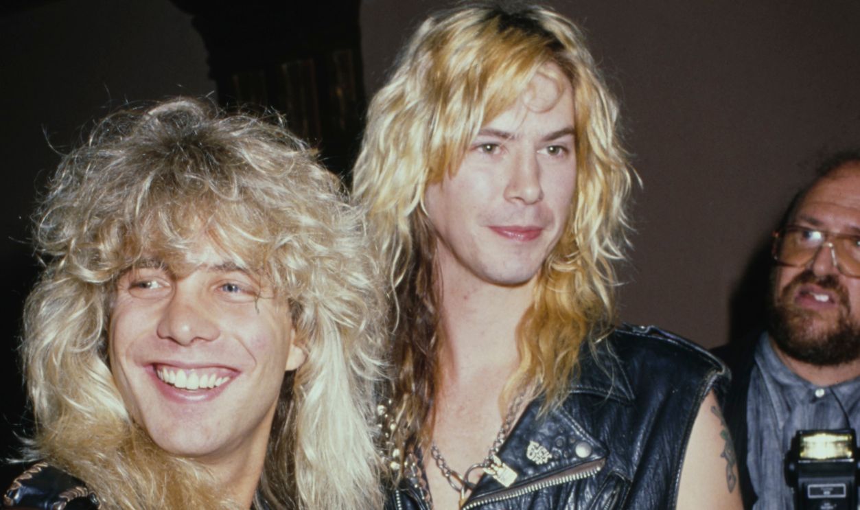 American drummer and songwriter Steven Adler and American guitarist and songwriter Duff McKagan, both in black leather waistcoats, attend an event, United States, circa 1990. Adler and McKagan are bandmates in American rock band Guns n' Roses.