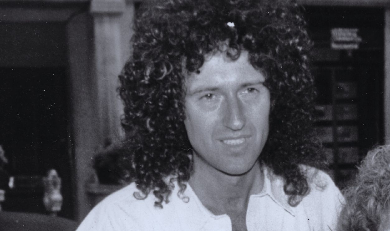 Guitarist Brian May of British rock band Queen with actress and singer Anita Dobson at the launch of their single 'Talking of Love', London, 7th July 1987.