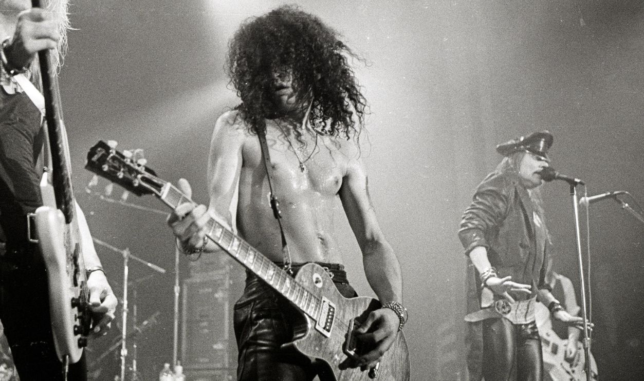 American musicians Duff McKagan, Slash, and Axl Rose, of the group Guns 'n' Roses, perform in concert at the Ritz, New York, New York, February 2, 1988.