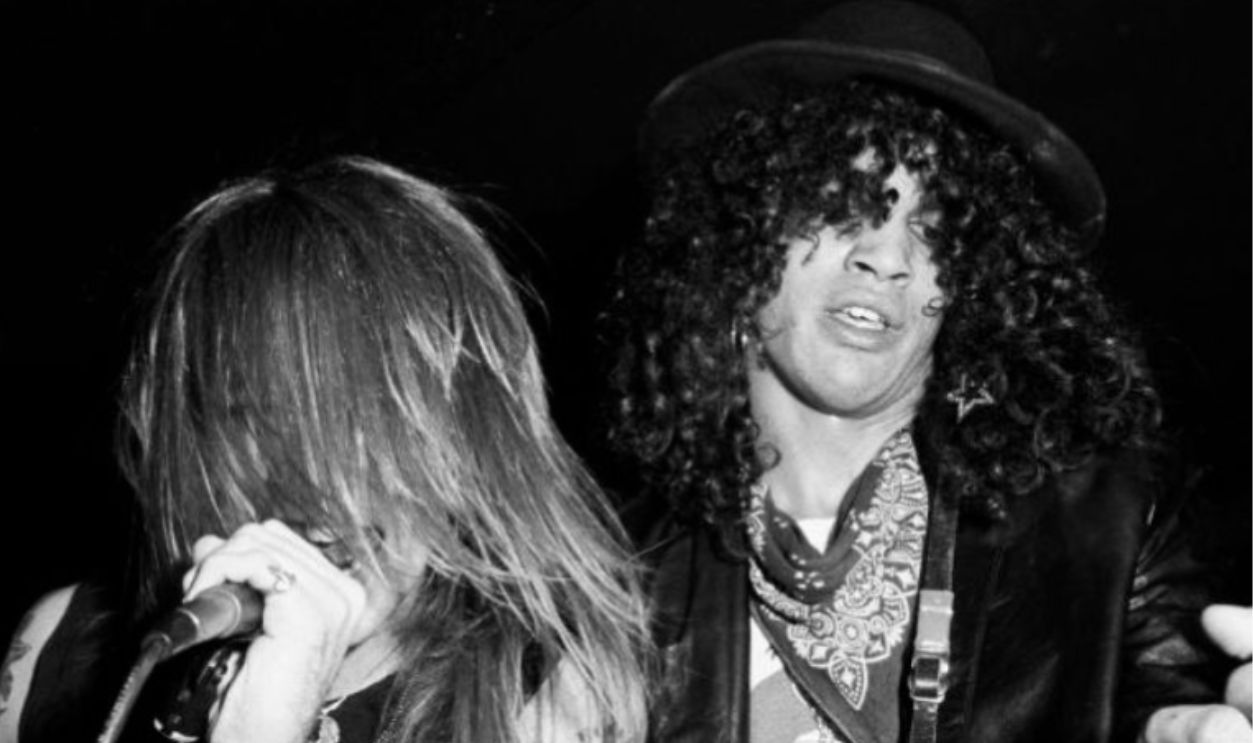 ANAHEIM, CA - OCTOBER 31: Axl Rose and Slash of the rock band Guns n' Roses performst at Radio City on October 31, 1985 in Anaheim, California.