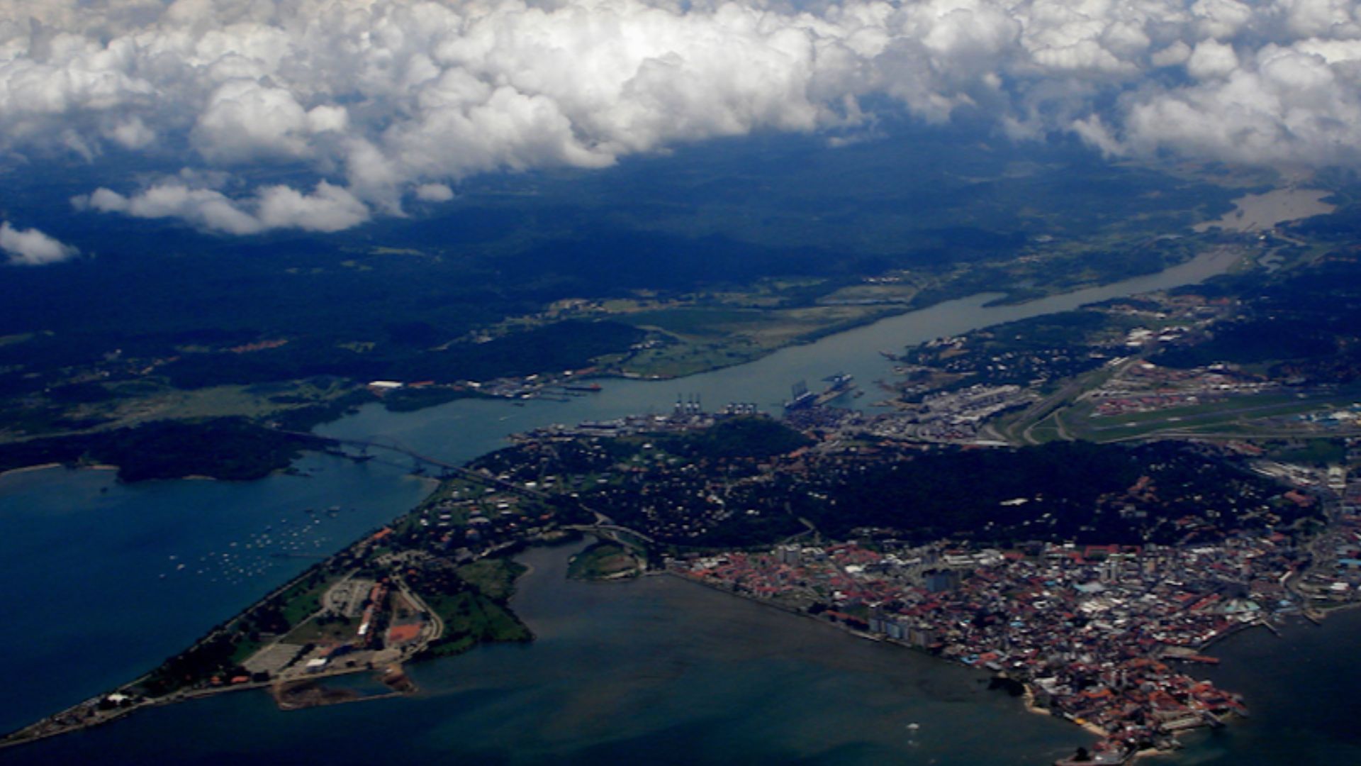 Pacific Side Entrance of the Panama Canal. In the foreground part of Panama city is visible together with the Bridge of the Americas. In the background (right) Miraflores Locks are also visible.