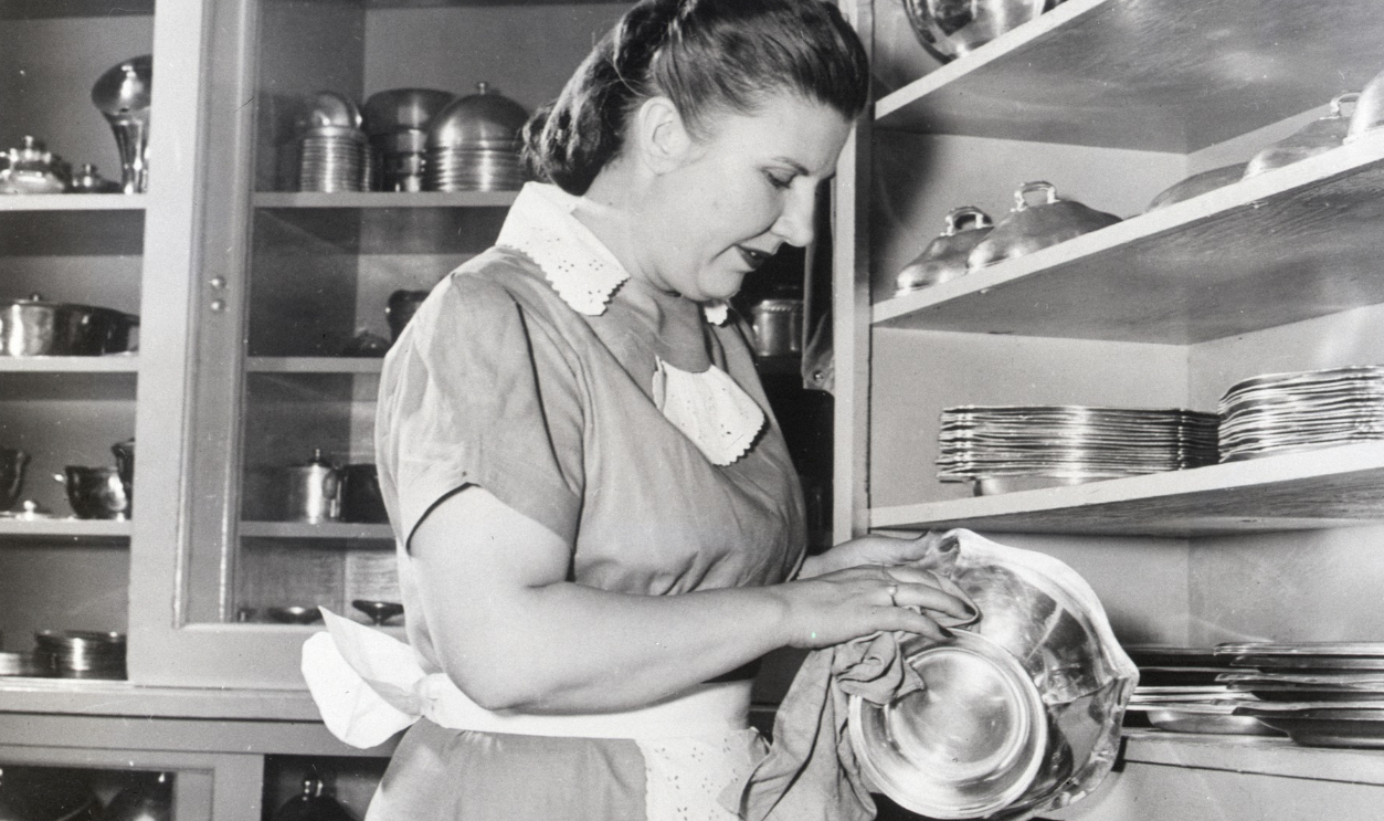 Woman Cleaning Silver-Ware