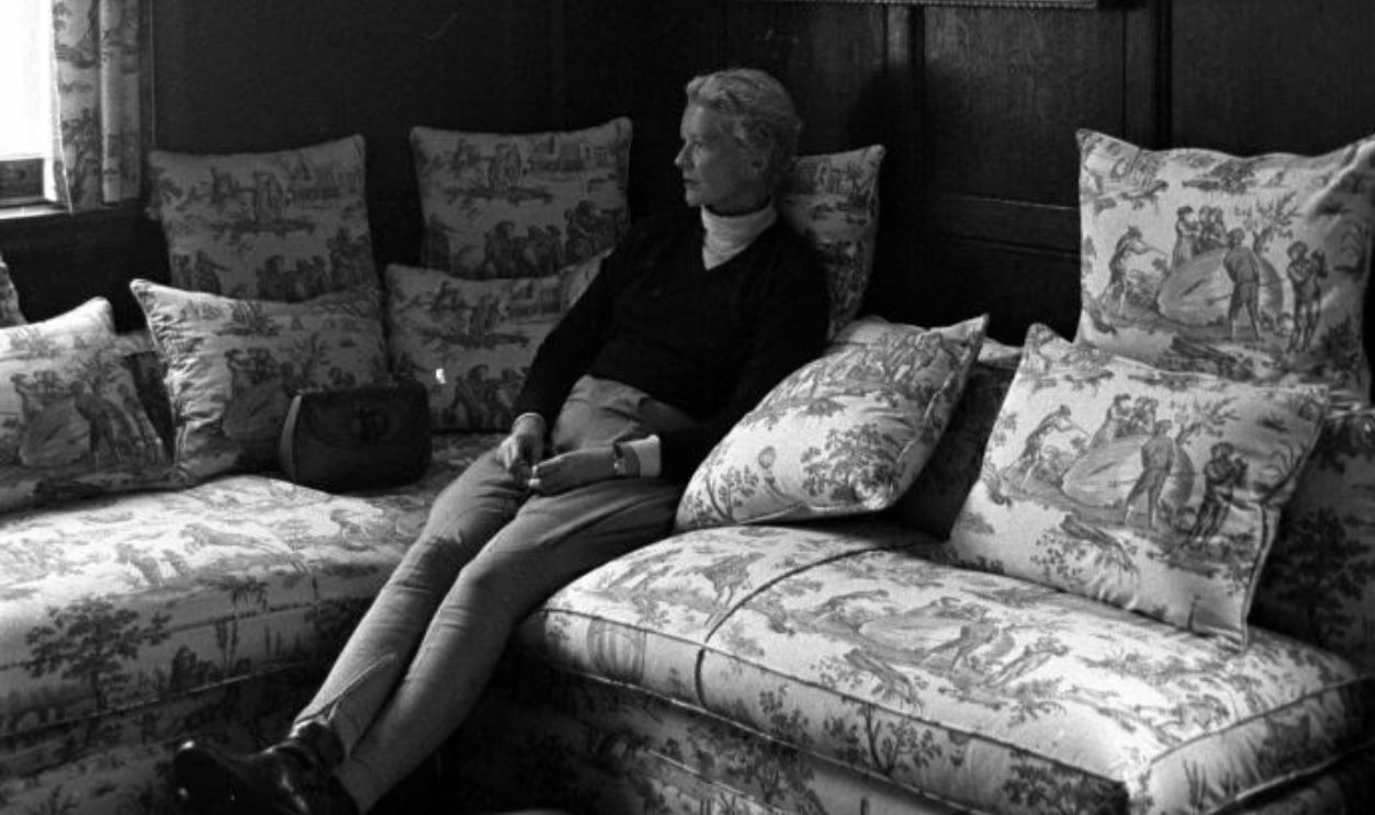 CZ Guest sitting on a sofa at home