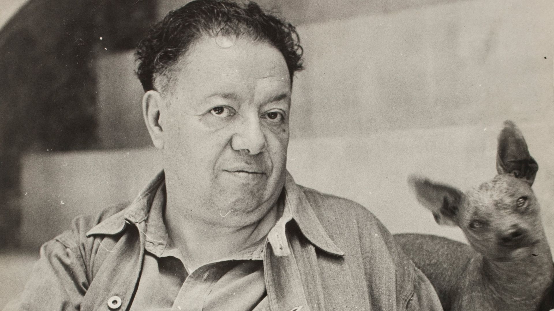 File:Diego Rivera with a xoloitzcuintle dog in the Blue House, Coyoacan - Google Art Project.jpg