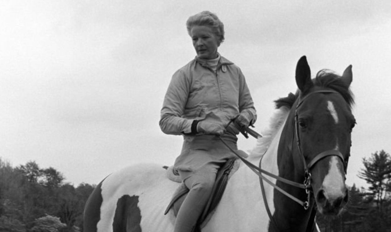 C.Z. Guest horseback riding on her Templeton estate. 