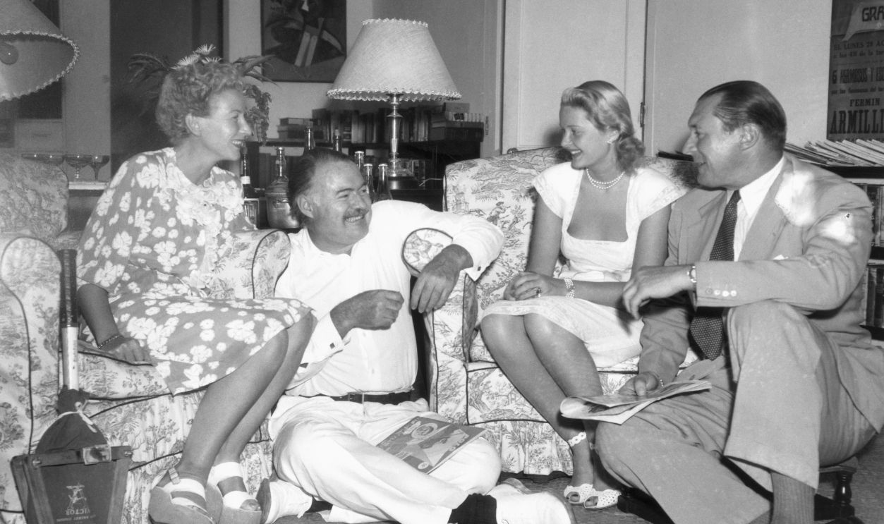(Original Caption) For Whom Wedding Bells Toll. Havana, Cuba: Mr. and Mrs. Ernest Hemingway (left)- he is the author of the best seller For Whom the Bell Tolls - with Mr. and Mrs. Winston Guest after the famed polo player married the former Miss Luc-Douglas Cochrane, of Boston, in the Hemingway home in San Francisco de Paula, Havana. Guest is a cousin of Britain's Winston Churchill.
