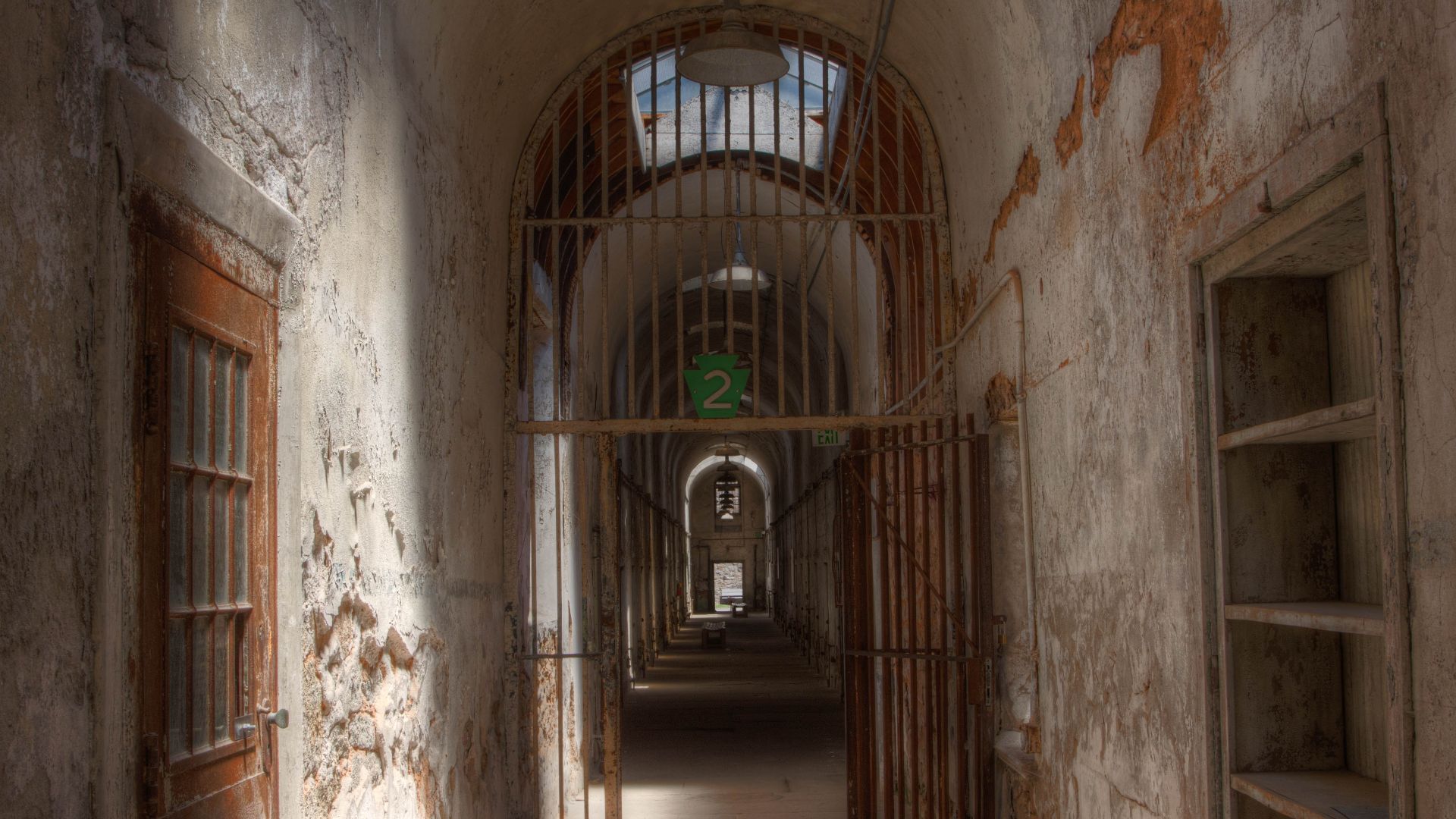Eastern State Penitentiary was once the most famous and expensive prison in the world, but stands today in ruin, a haunting world of crumbling cellblocks and empty guard towers.
Known for its grand architecture and strict discipline, this was the world’s 