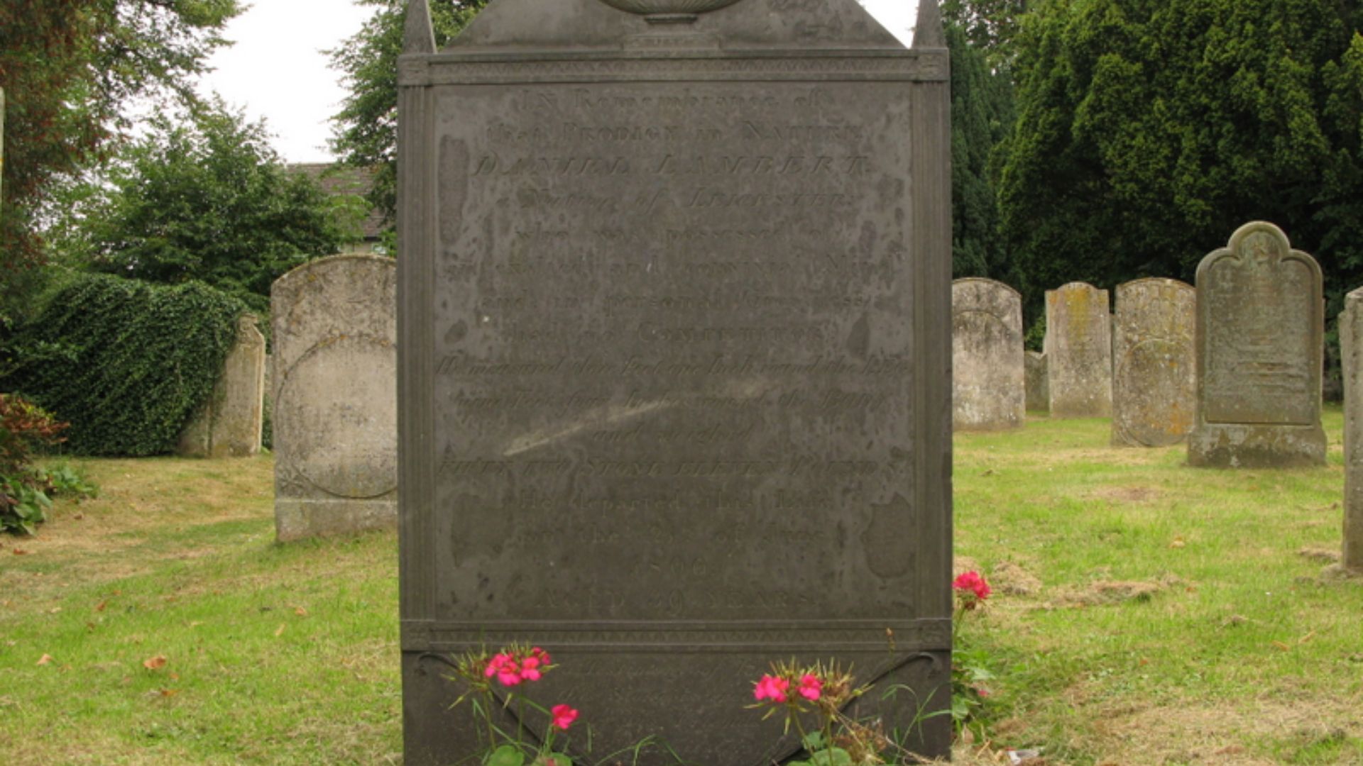 St Martin's churchyard, Stamford. Grave of Daniel Lambert,d.1809.As a child I was always fascinated by Daniel Lambert's clothes ,chair etc in a Leicester museum.As a single,childless male,I've always been baffled by the practice of proud parents of a newb