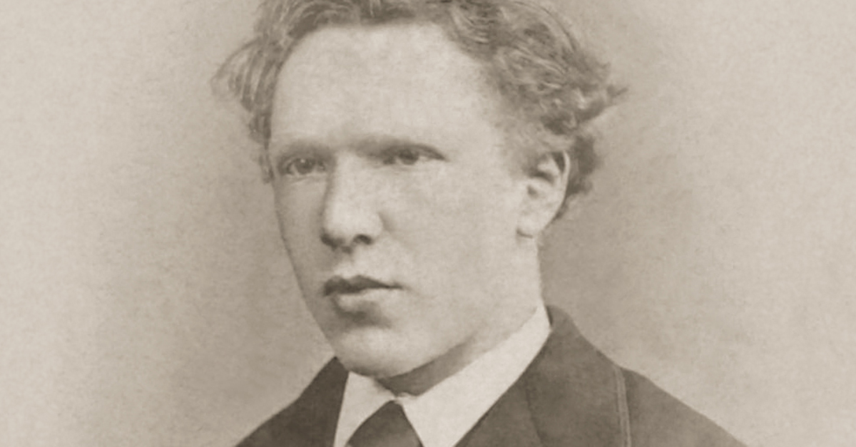 A black and white portrait of a young 19-year-old Vincent van Gogh