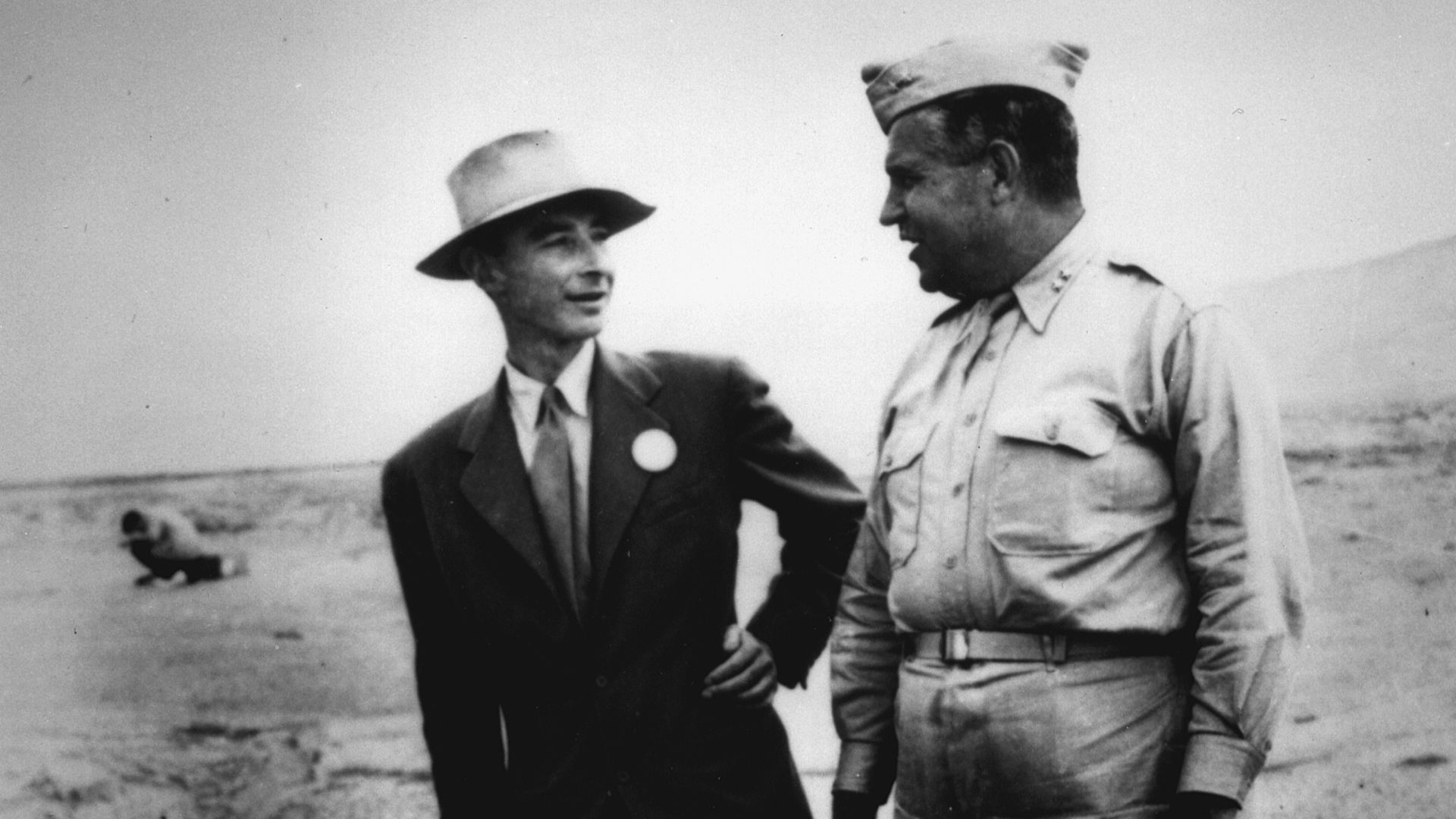 File:Robert Oppenheimer (left) and General Leslie Groves (right) at Ground Zero of the nuclear bomb test site.jpg