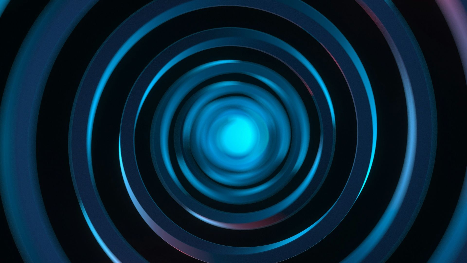 a blue and red circular pattern with a black background