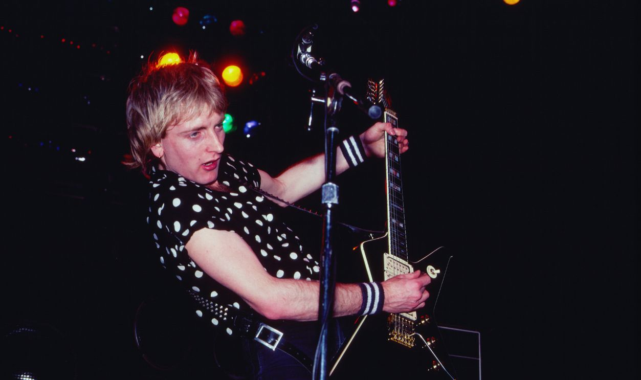 Gettyimages - 2218817463, Def Leppard Perform At Nassau Coliseum English Rock musician Phil Collen, of the group Def Leppard, plays electric guitar, as he performs, during the 'Pyromania' tour, onstage at Nassau Coliseum (later Nassau Veterans Coliseum), Uniondale, New York, March 25, 1983.