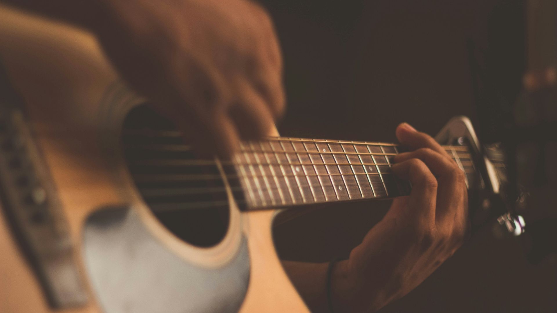 person playing guitar