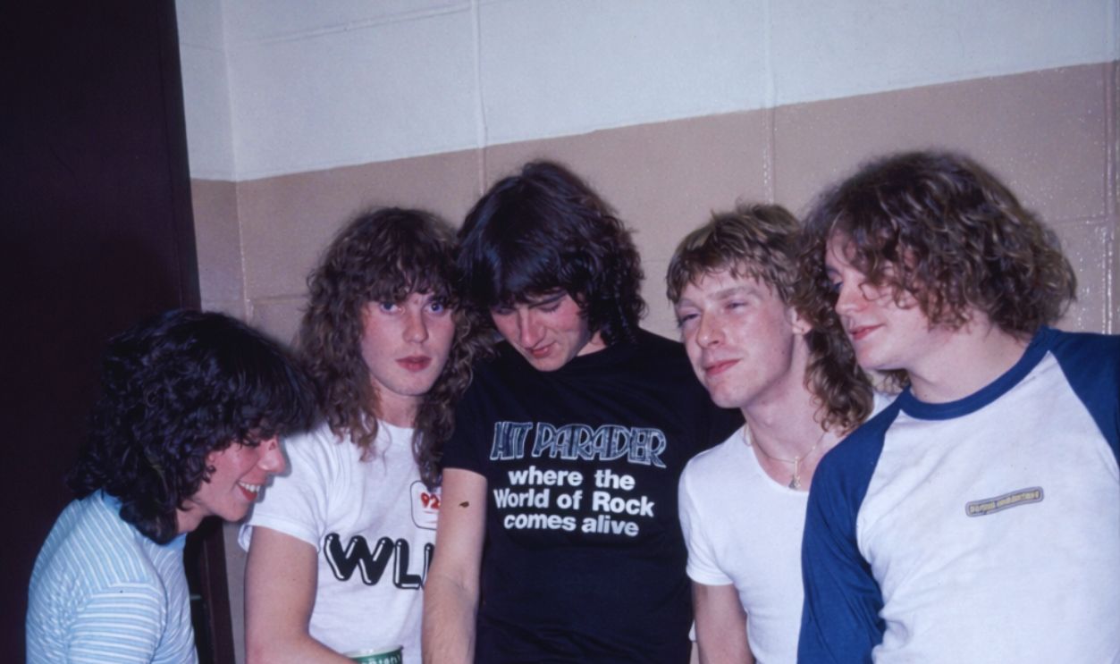 Gettyimages  - 1746922235, Def Leppard Backstage At Nassau Coliseum View of members of the English Rock group Def Leppard as they pose backstage following a performance at Nassau Coliseum (later Nassau Veterans Memorial Coliseum), Uniondale, New York, August 14, 1981. Pictured are, from left, Pete Willis, Rick Savage, Joe Elliott, Steve Clark (1960 - 1991), and Rick Allen. The group performed at the venue, as an opening act (along with Scorpions) for headliner Ozzy Osbourne.