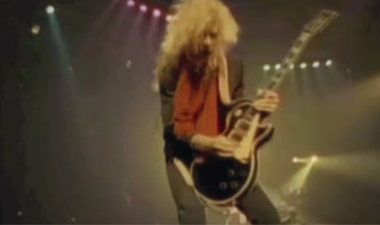 Screenshot from Def Leppard – “White Lightning” (2015)