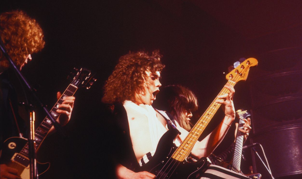 Gettyimages  - 1605048247, Def Leppard Performs At The Music Machine (MANDATORY CREDIT Watal Asanuma/Shinko Music/Getty Images) From left, English Rock musicians Steve Clark (1960 - 1991), on guitar, Rick Savage, on bass, and Pete Willis, on guitar, all of the group Def Leppard, perform on stage at the Music Machine, London, England, 27th February 1980.