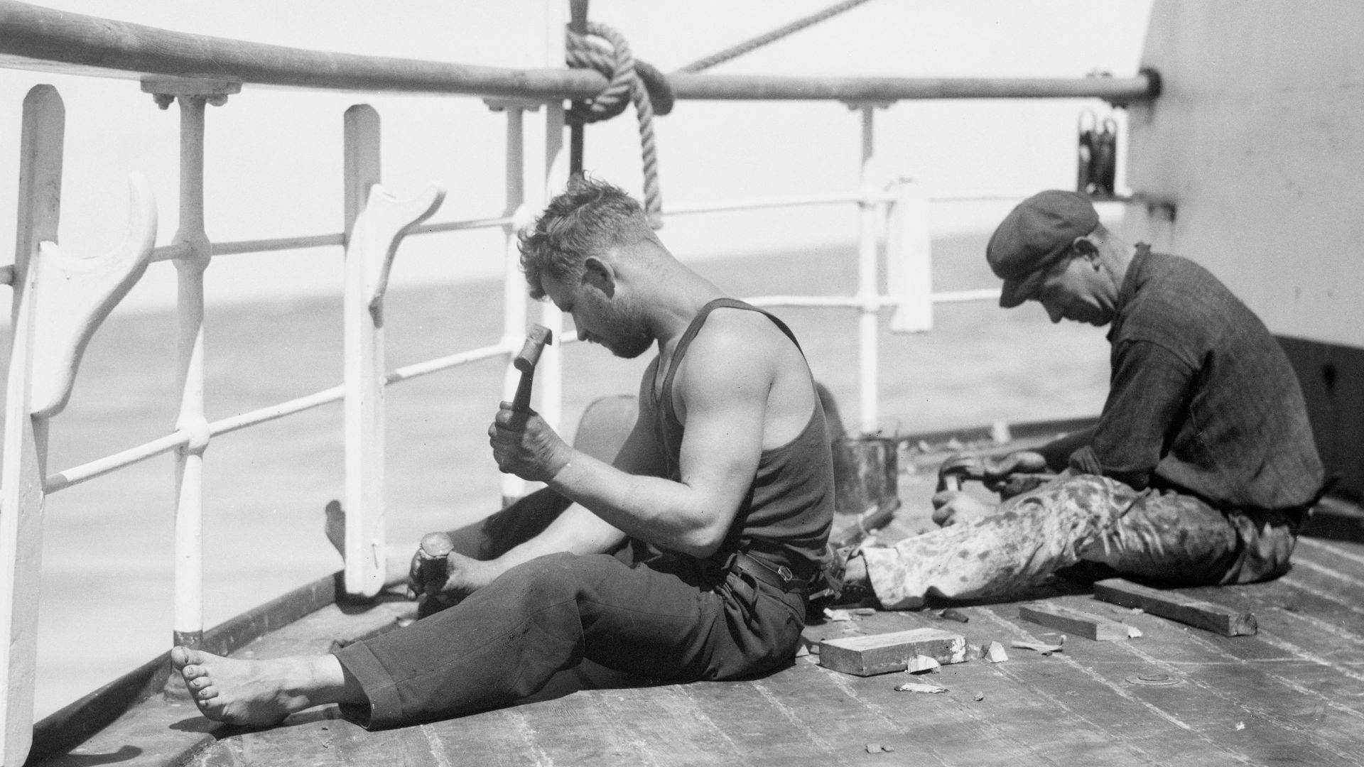 File:Parma -- renewing caulking on the poop.jpg