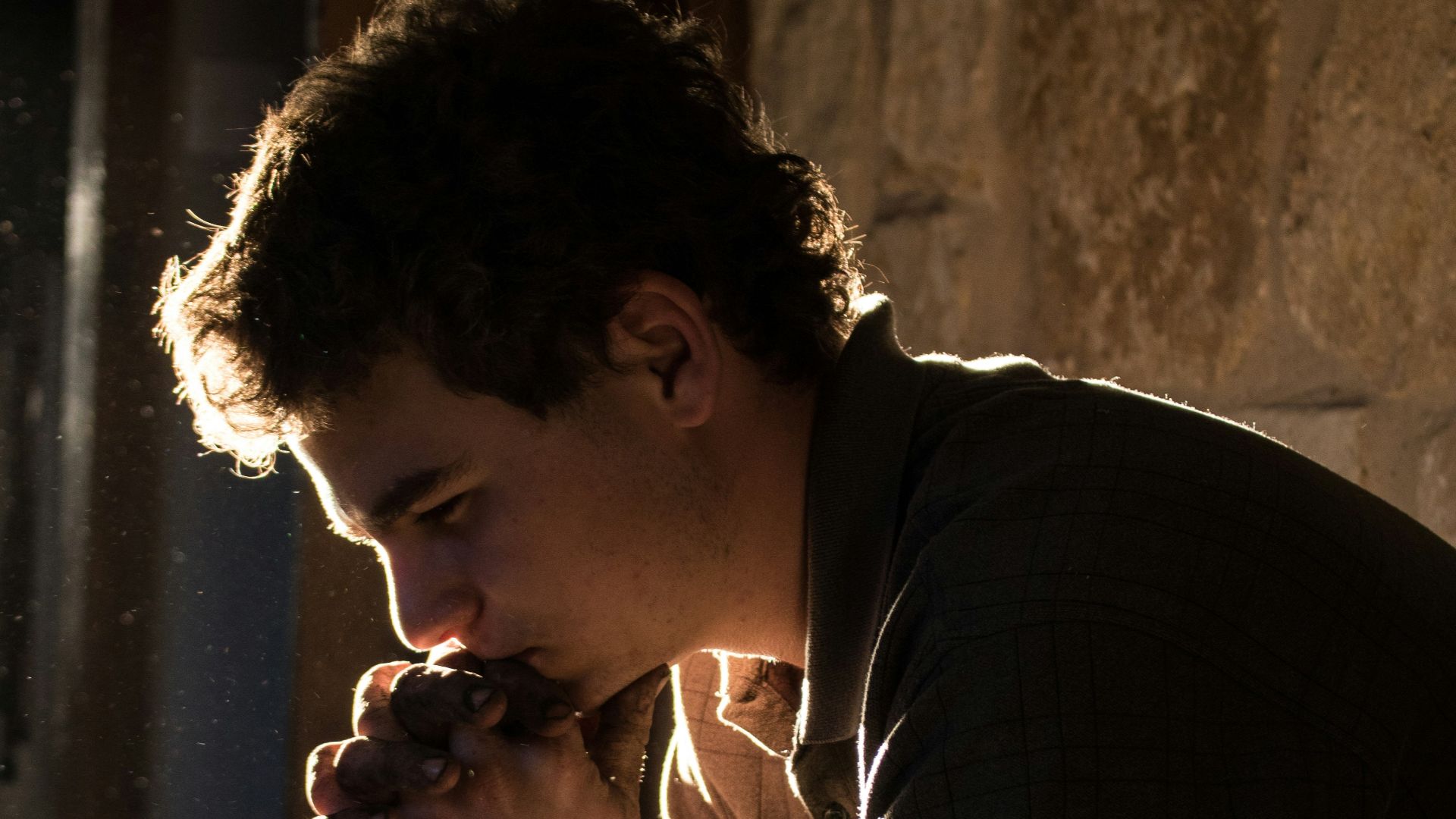 man sitting on bench