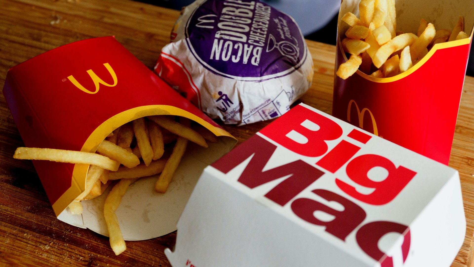 a sandwich sitting on top of a wooden table