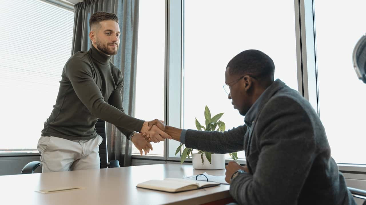 Successful Job Interview with handshake.