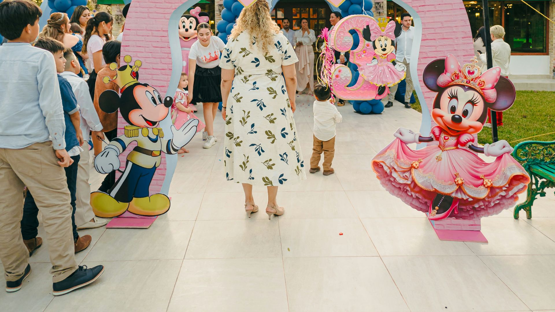 Minnie mouse themed birthday party entrance with castle entrance