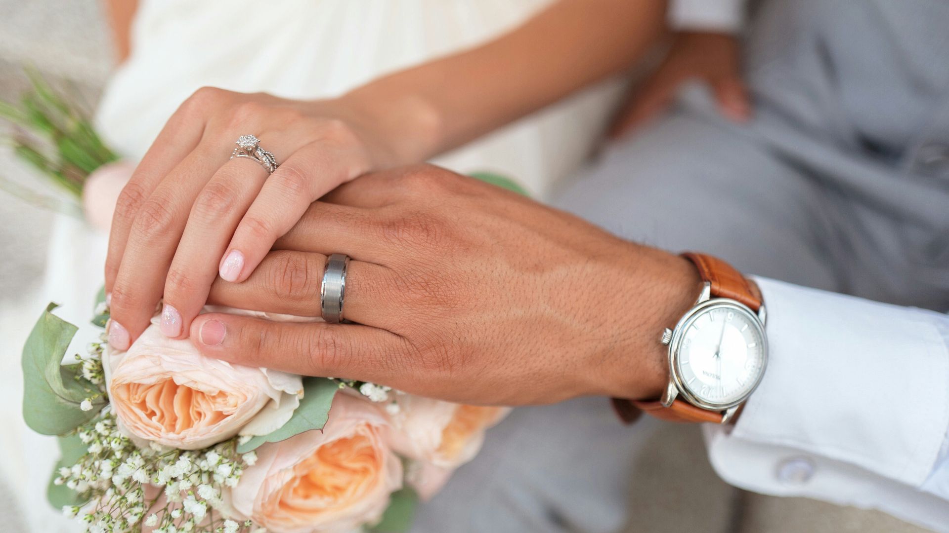 man and woman holding hands
