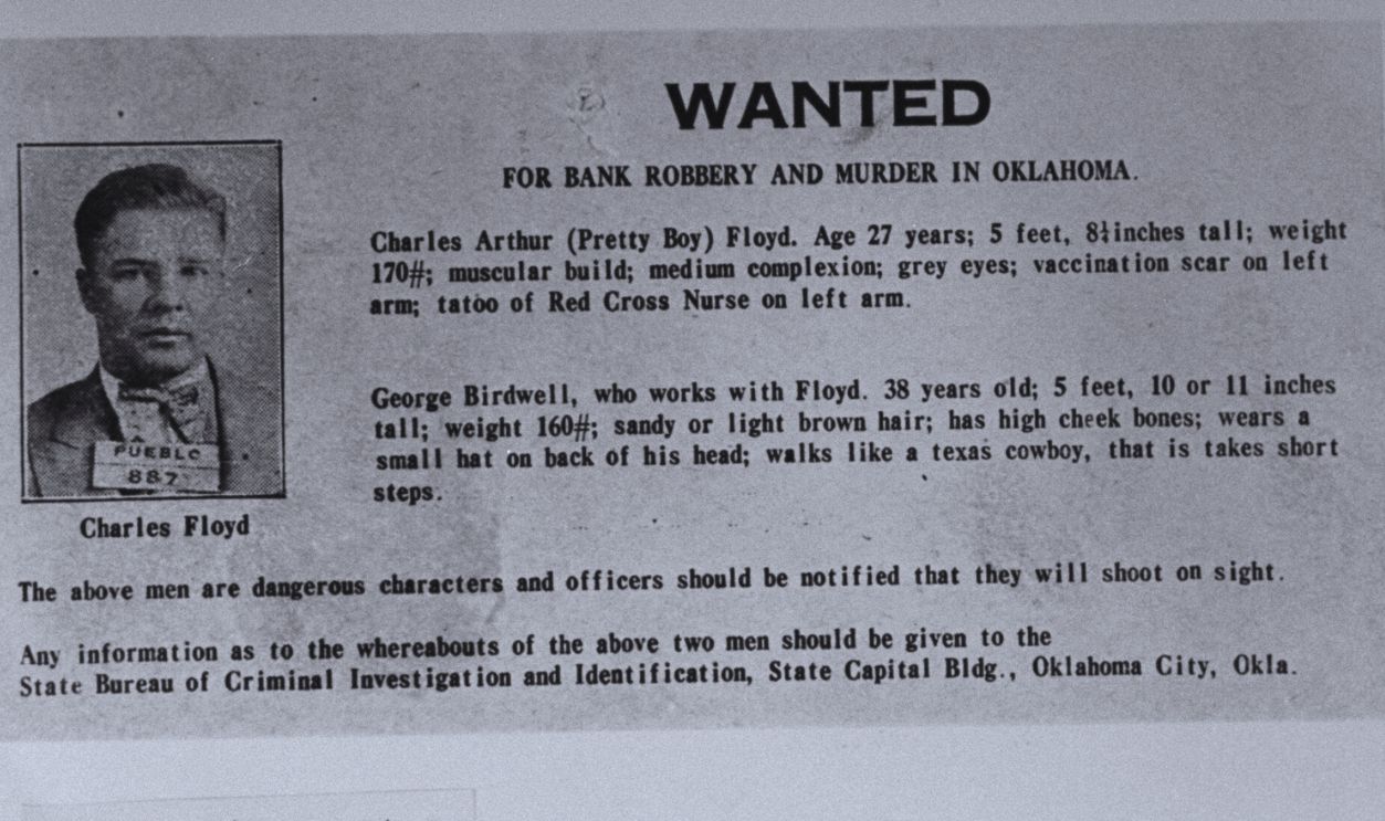 Gettyimages - 50611644, George Birdwell [Misc.];Charles Floyd [Misc.] Closeup of wanted poster w. small mug shot photo of murderous bank robber Charles Pretty Boy Floyd, next to info about Floyd & his accomplice, George Birdwell, as well as instructions on whom to contact if you know the whereabouts of the men