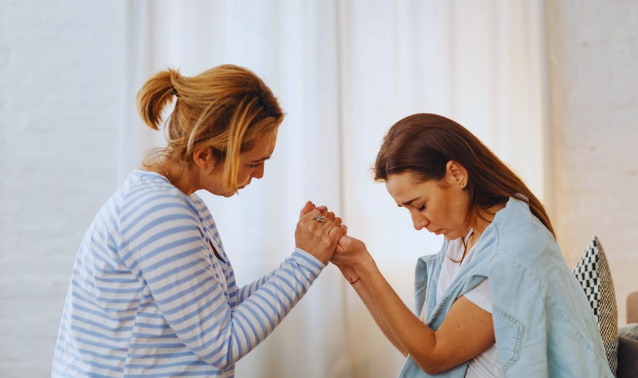 Woman Comforting and Supporting Friend