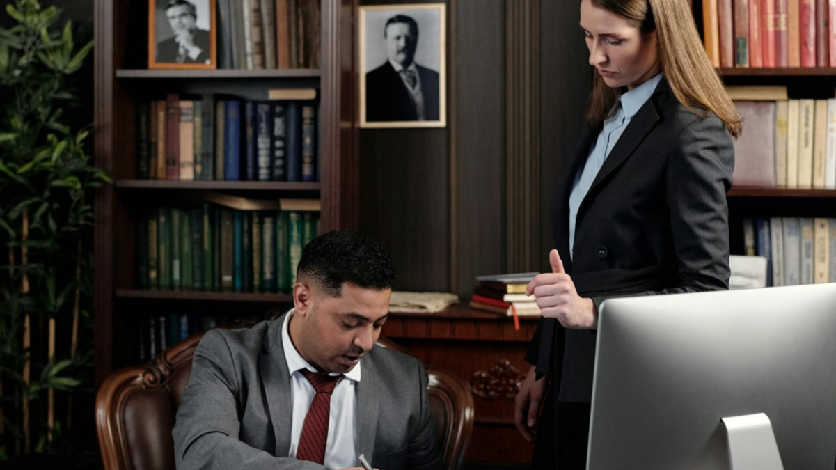 Lawyers in an Office Looking at Documents