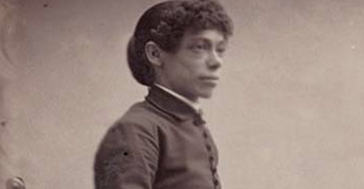 Portrait of Fanny Mills, showcasing her famous legs.