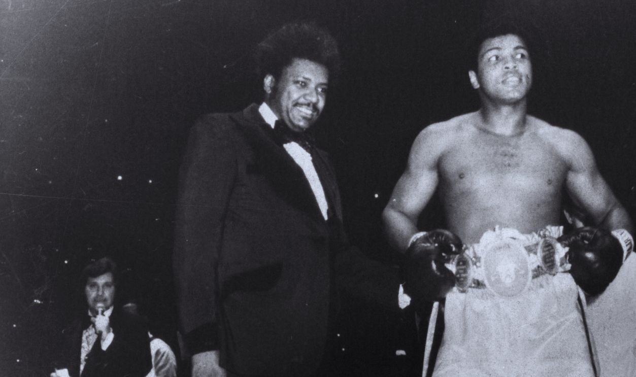 Gettyimages - 157078641, Muhammad Ali v Chuck Wepner CLEVELAND - MARCH 24,1975: Muhammad Ali wears his belts in the ring after winning the fight against Chuck Wepner at Richfield Coliseum on March 24,1975 in Cleveland,Ohio. Muhammad Ali won the WBC heavyweight title and the WBA World heavyweight title by a TKO 15.