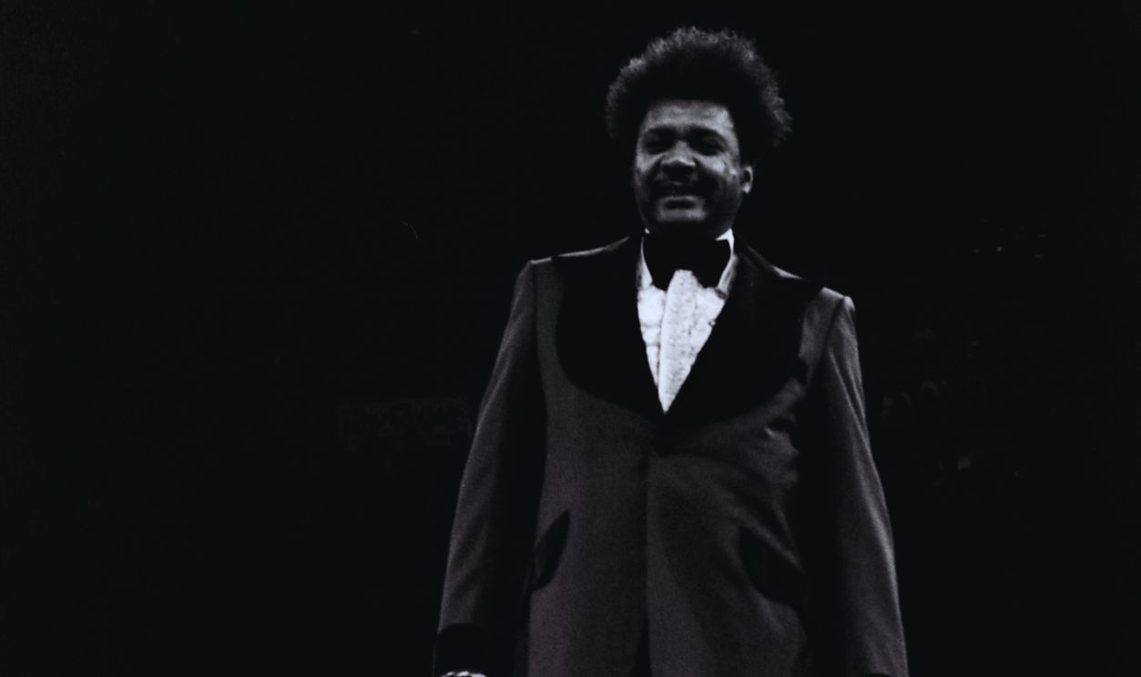 Gettyimages - 158705343, Larry Holmes v Fred Askew LANDOVER,MD - APRIL 05: Promoter Don King stands in the ring before the fight between Larry Holmes and Fred Askew at the Capital Centre on April 5, 1976 in Landover, Maryland. Larry Holmes defeated Fred Askew by a TKO 2.