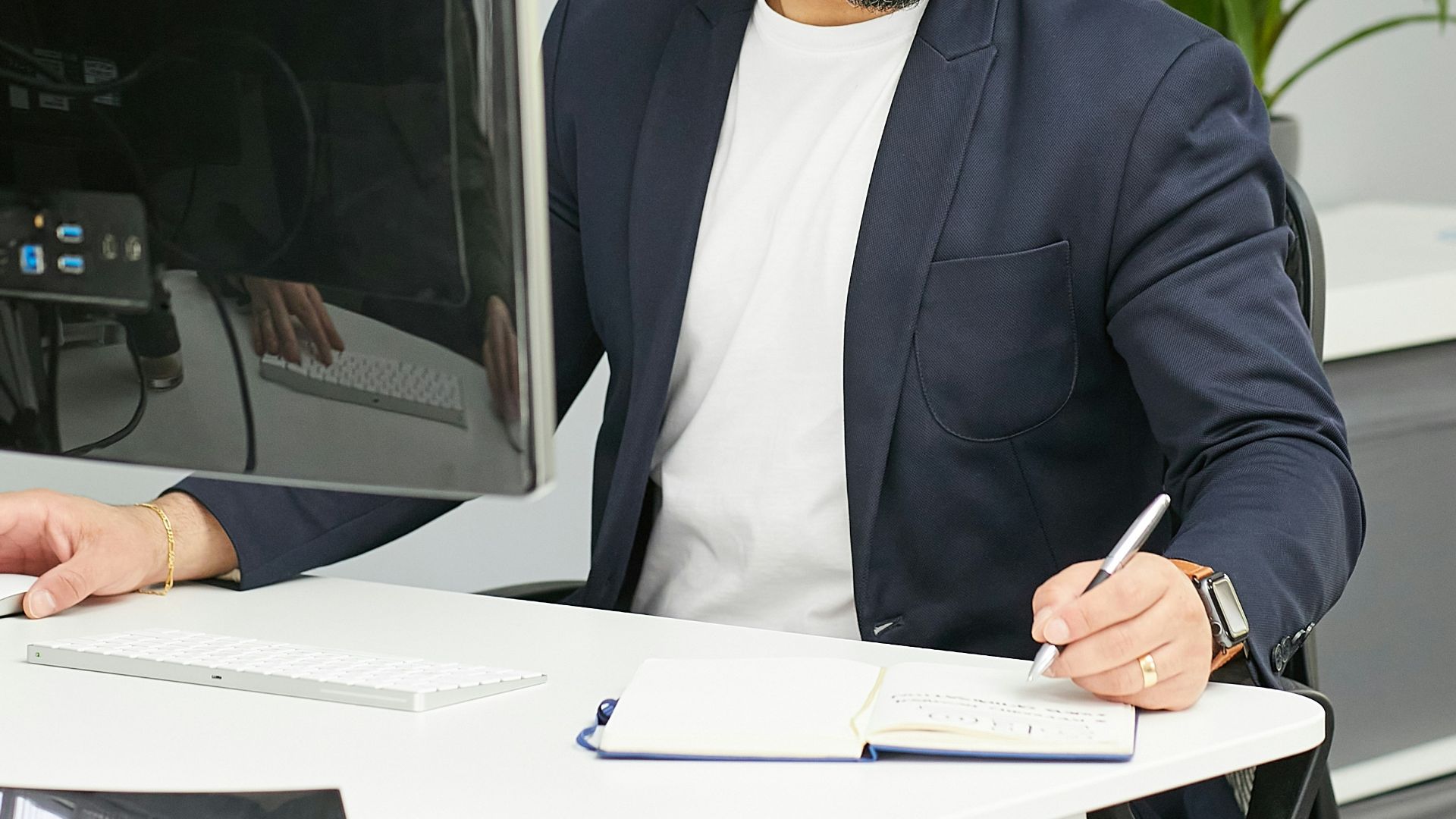 a man sitting at a desk