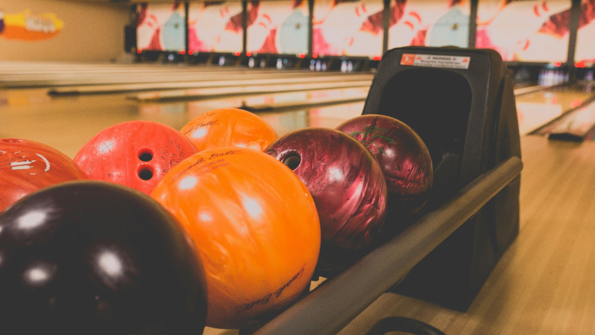 bowling balls on rack