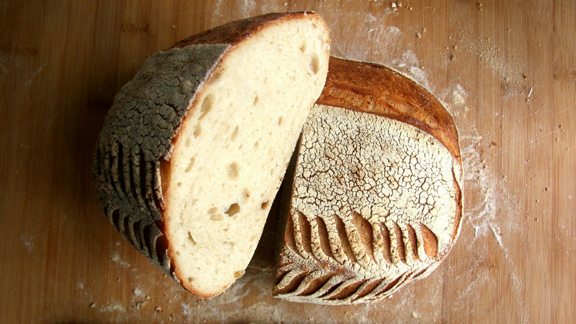 sliced bread on brown wooden chopping board